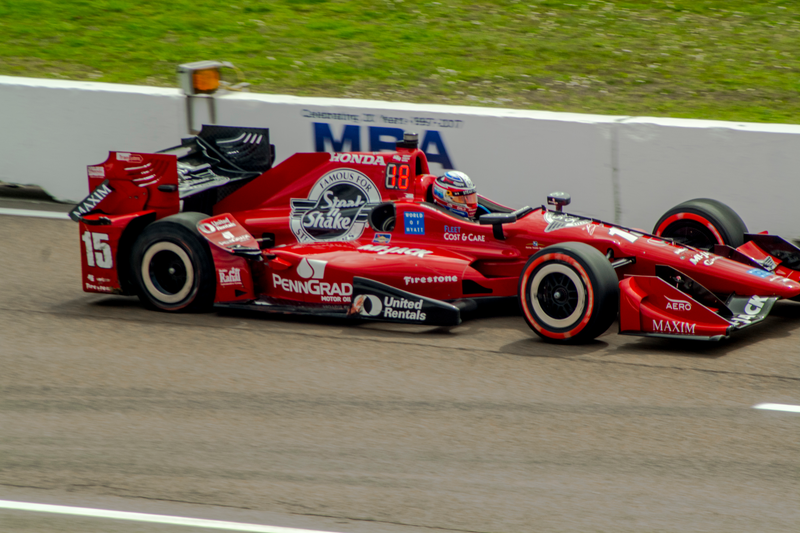 Graham Rahal hits the pits after loosing some bits on lap one.